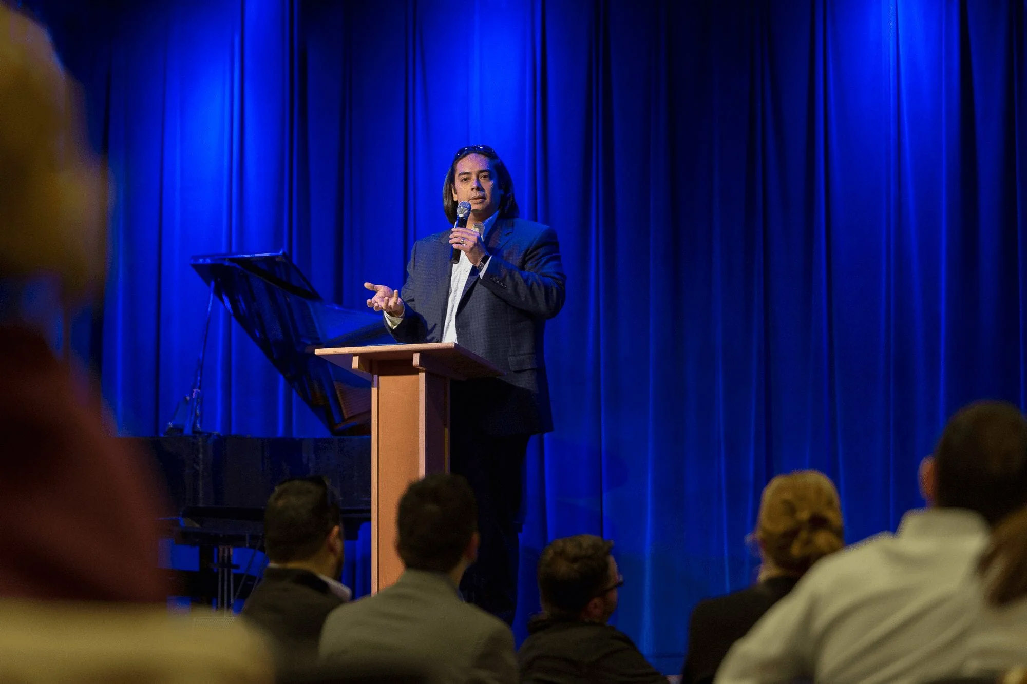 Knoxville corporate event photography of a speaker presenting to an audience