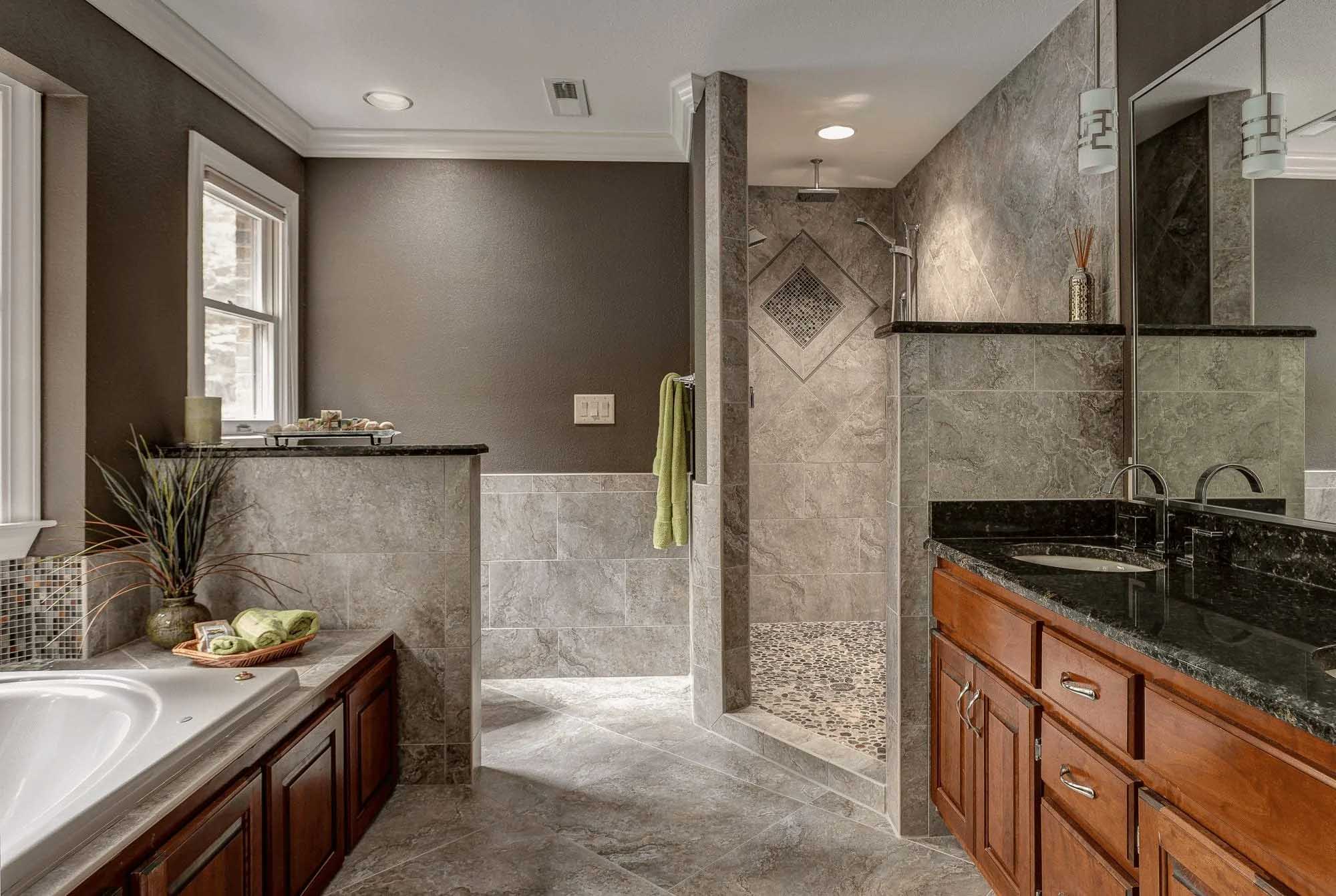 Knoxville interior photography of a remodeled bathroom with tiled walk-in shower and custom cabinetry