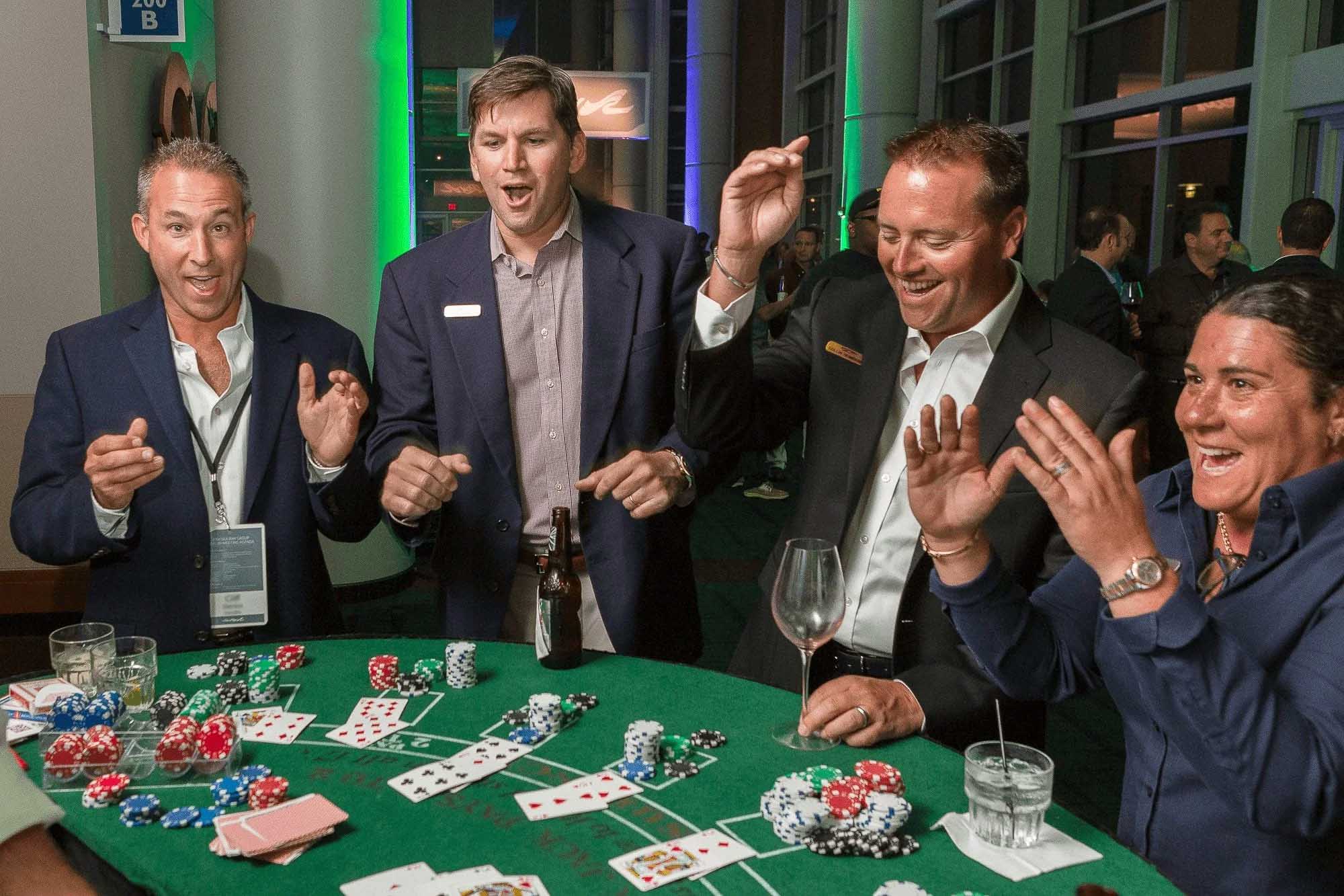Knoxville corporate event photography of attendees enjoying a casino night