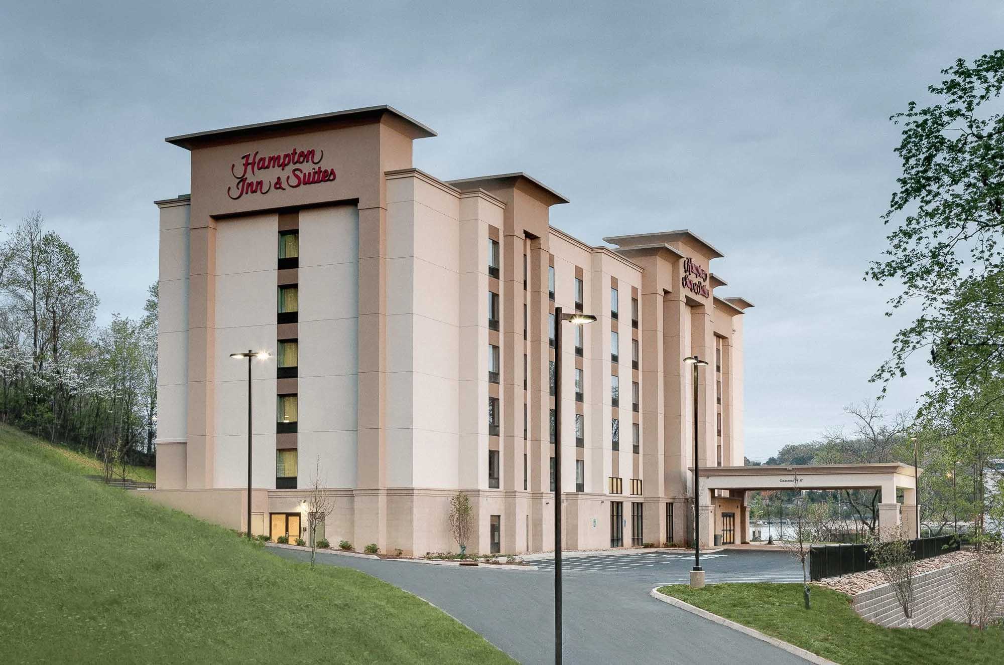 Knoxville architectural photography of a Hampton Inn & Suites hotel exterior showing the multi-story building, entrance, and surrounding grounds