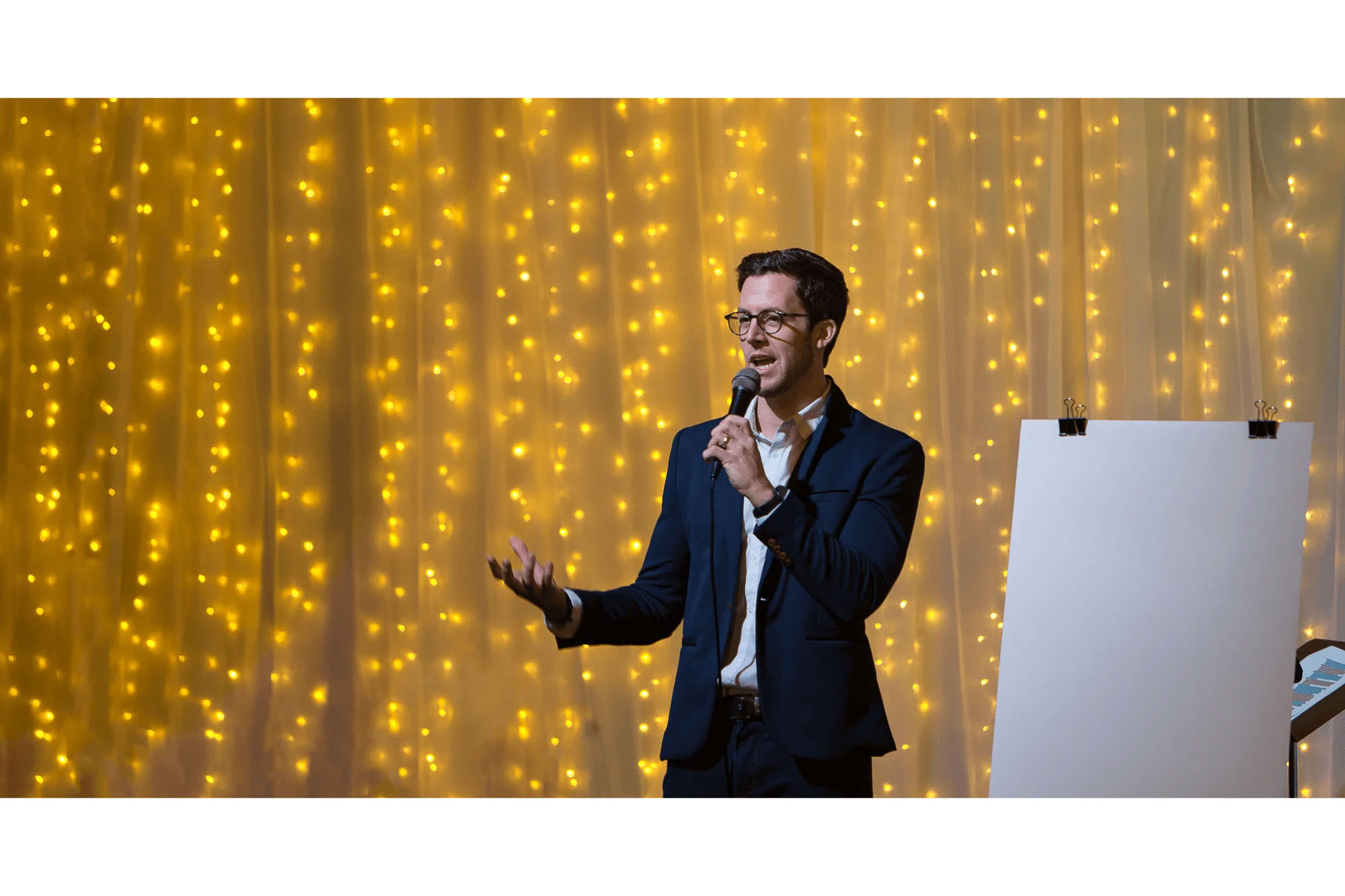 Knoxville corporate event photographer captures a speaker addressing guests at a fundraising event.
